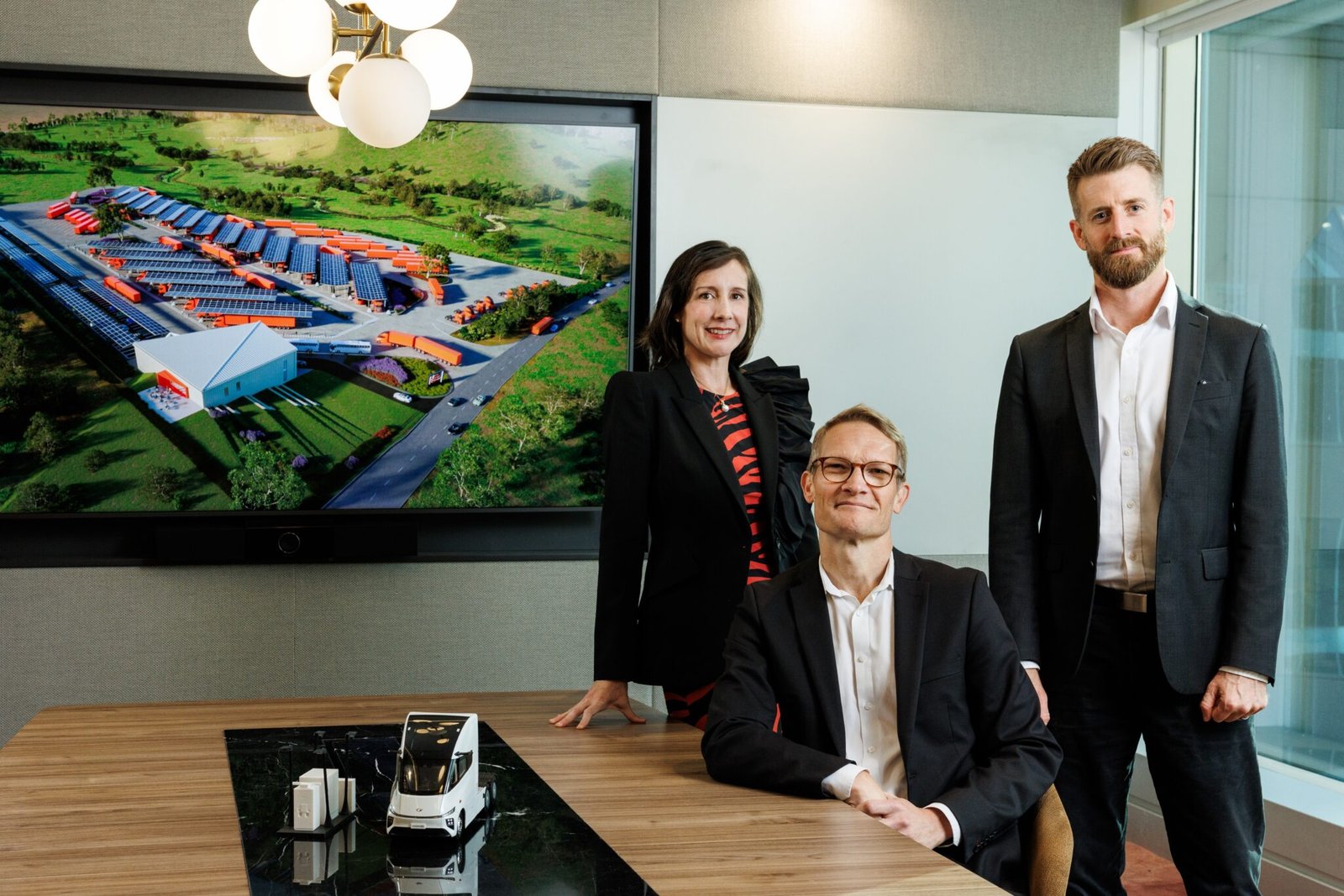 New Energy Transport Co-CEOs Daniel Bleakley and Fredrik Pehrsson with Jekara Group's Kara Frederick